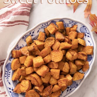 Roasted sweet potatoes on a blue and white platter