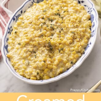 Creamed corn in a blue and white serving dish.