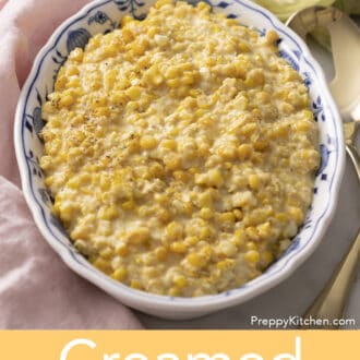 Creamed corn in a blue and white bowl