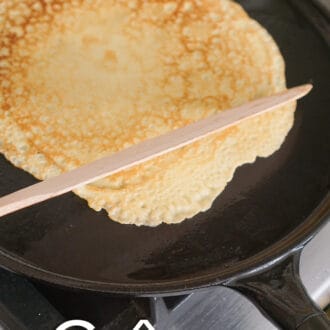Pinterest graphic of crepe batter in a crepe pan.