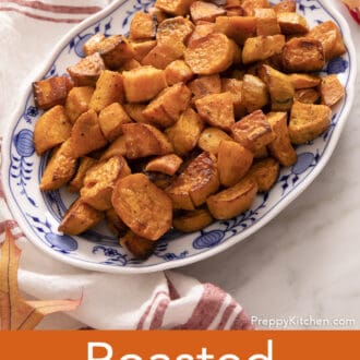 Roasted sweet potatoes on a blue and white platter
