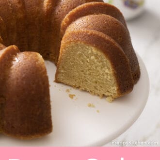 rum cake sitting on a cake stand