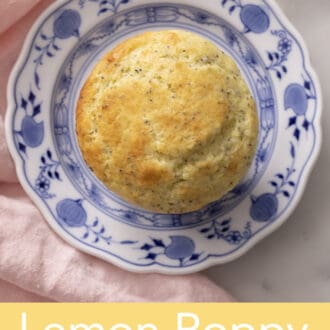 overhead shot of a lemon poppy seed muffin on a blue and white plate