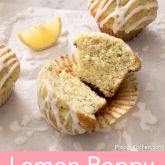 a lemon poppy seed muffin cut in half on a piece of parchment paper