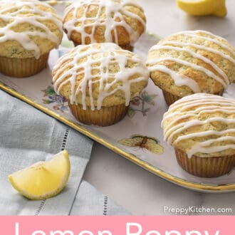 several lemon poppy seed muffins on a porcelain tray