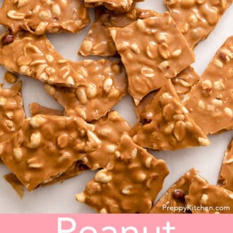 Peanut brittle arranged on a white surface.
