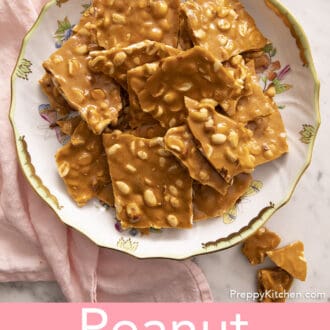 pieces of peanut brittle stacked on a floral platter