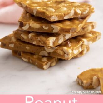pieces of peanut brittle stacked on a counter