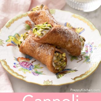 3 cannoli on a floral plate
