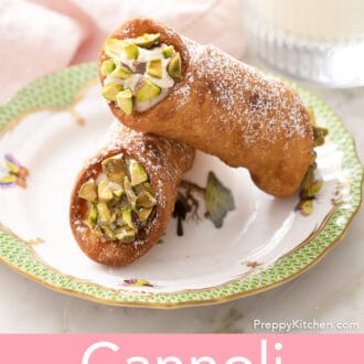 2 cannoli on a porcelain plate