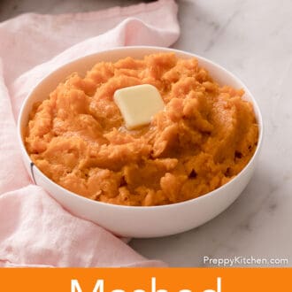 Mashed sweet potatoes with butter in a white bowl