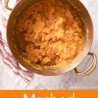 Mashed sweet potatoes in a copper pot