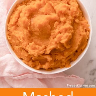 Mashed sweet potatoes in a white bowl