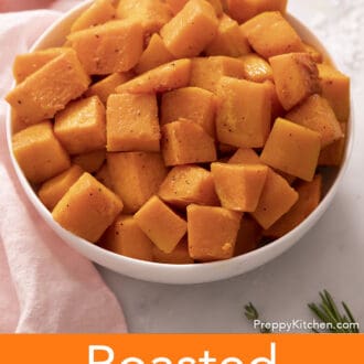 cubed roasted butternut squash in a white bowl
