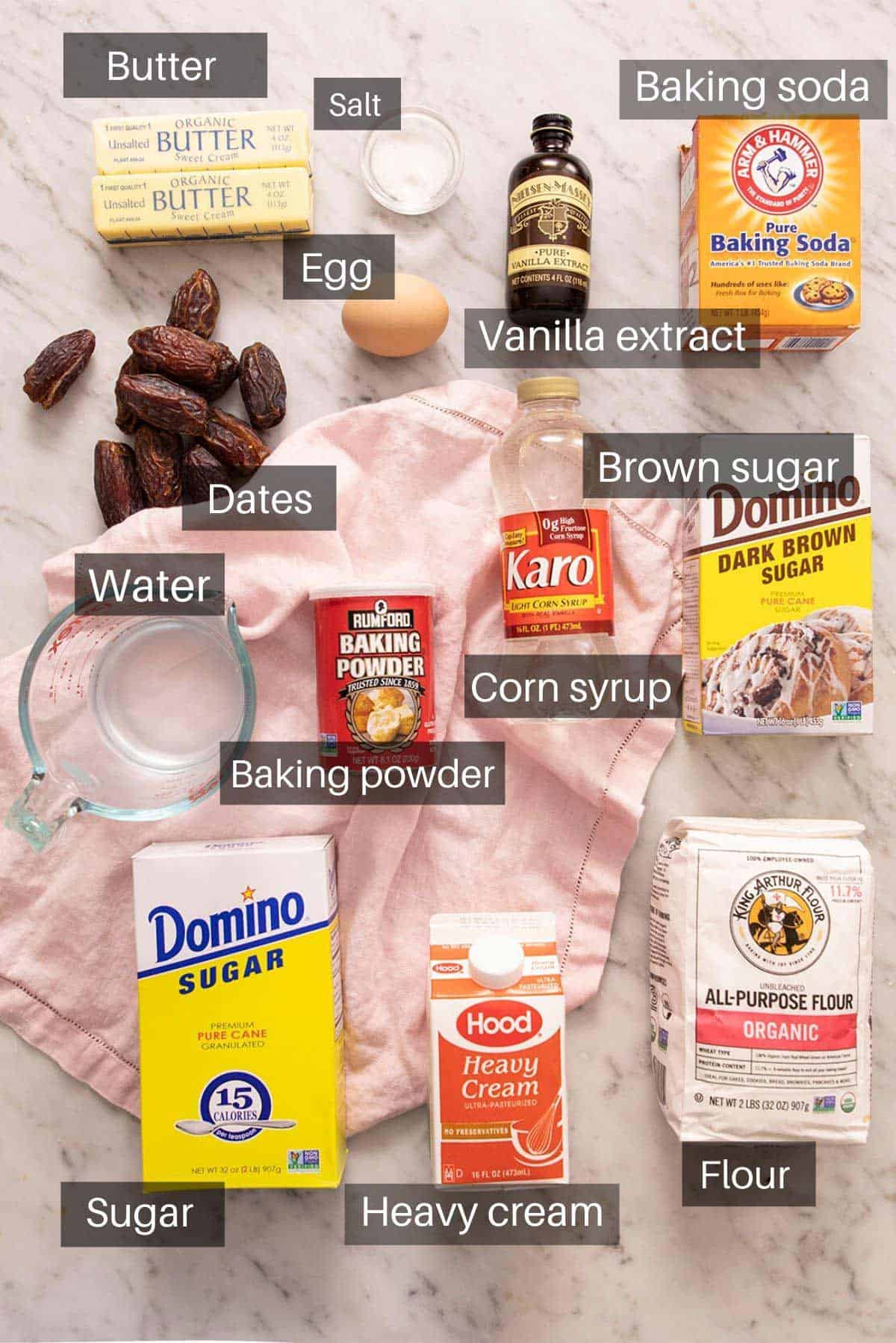 An overhead shot of all the ingredients you need to make sticky toffee pudding