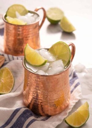 A side shot of a Moscow Mule cocktail in a copper mug
