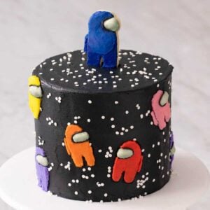 A close up of an among us cake