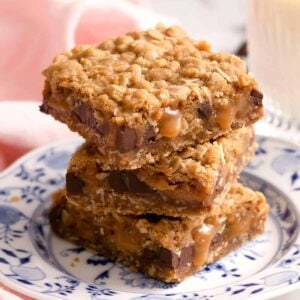 A close up of a stack of three carmelitas on a plate.