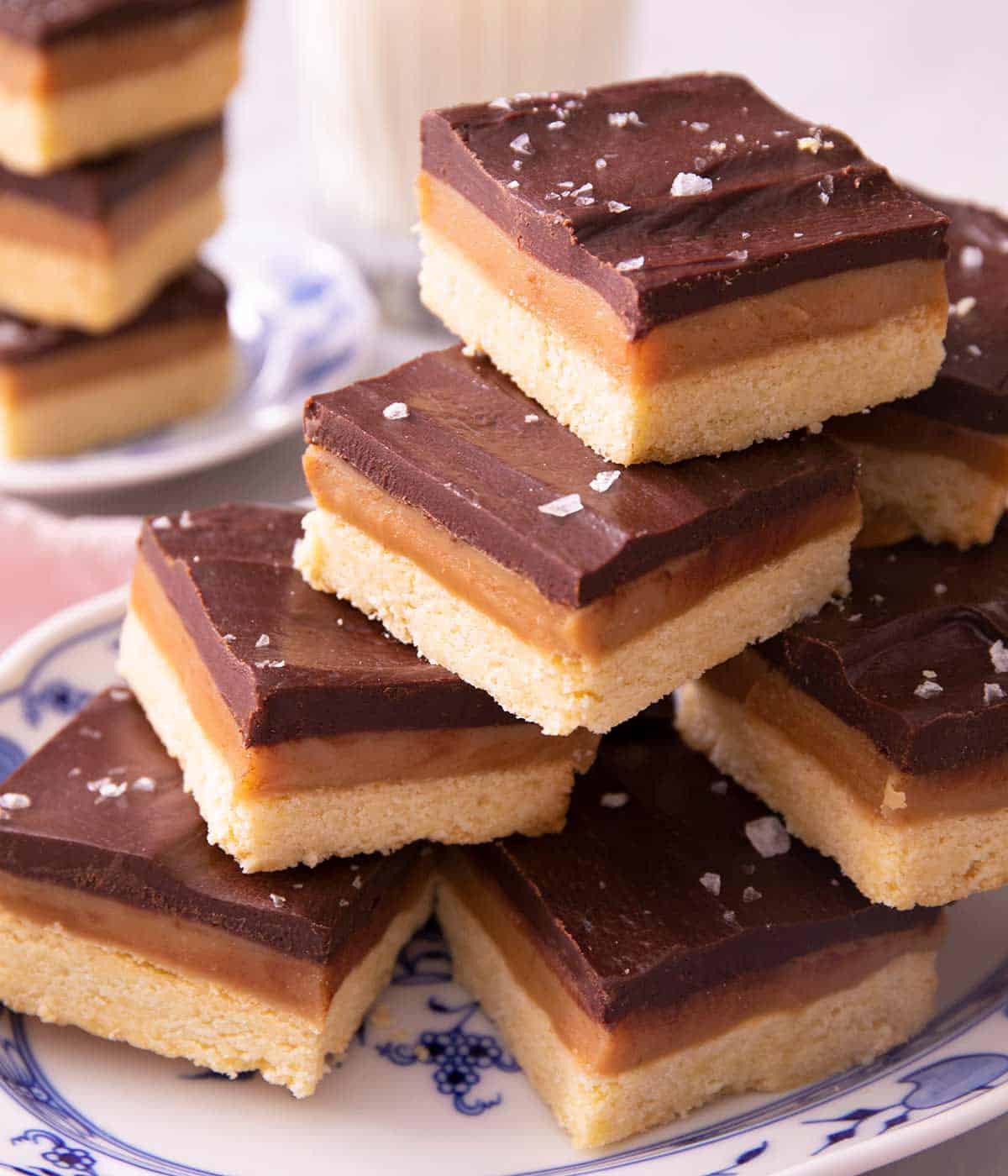 A stack of Millionaire's Shortbread on a blue plate