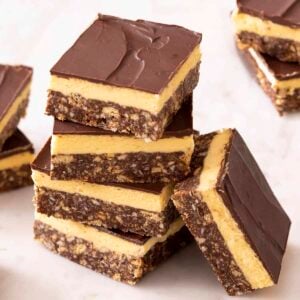 A close up of a stack of Nanaimo bars