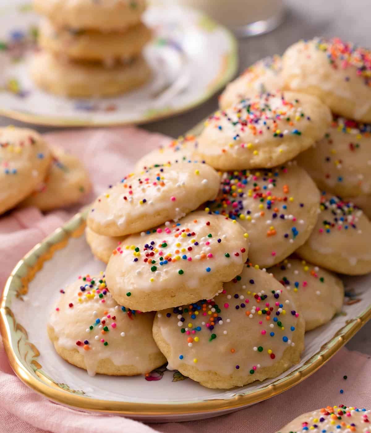 A pile of ricotta cookies on a serving plate