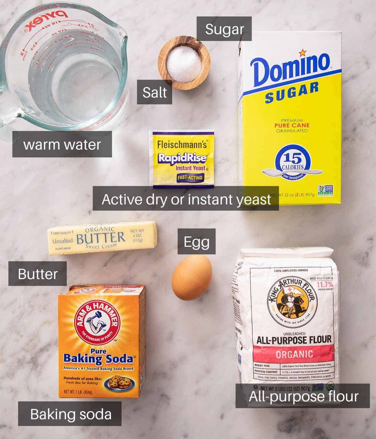 An overhead shot of all the ingredients you need to make soft pretzels