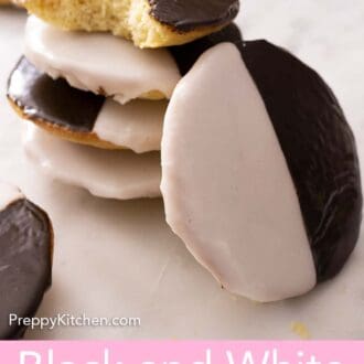 Pinterest graphic of a stack of four black and white cookies with one leaning against the stack.