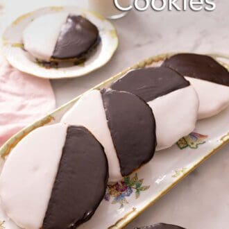 Pinterest graphic of a platter of black and white cookies.