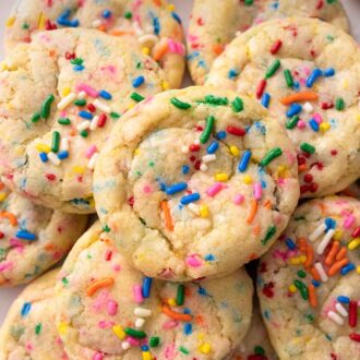 Pinterest graphic of a pile of multiple funfetti cookies.