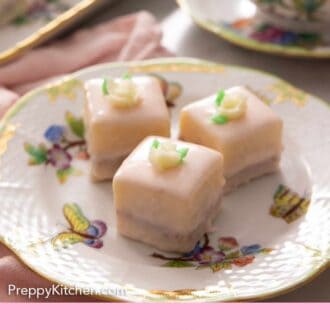 Pinterest graphic of a close up of three petit fours on a small plate.
