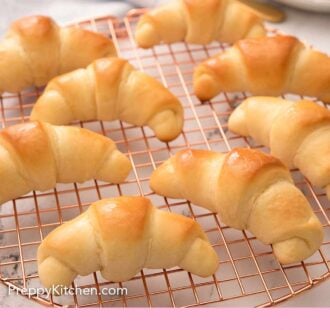 Pinterest graphic of crescent rolls on a circular rose gold cooling rack.