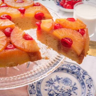 Pinterest graphic of a slice of pineapple upside down cake being lifted off the cake stand.