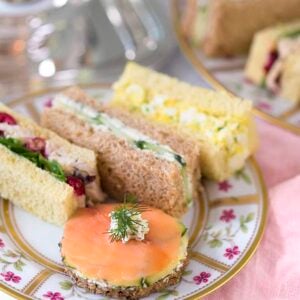 English tea sandwiches sitting on a floral plate
