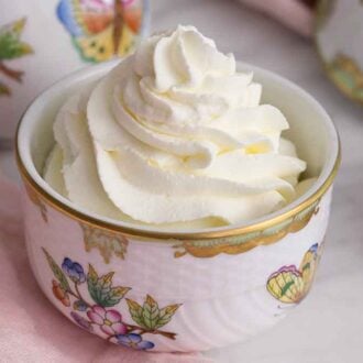 A small bowl of homemade whipped cream.