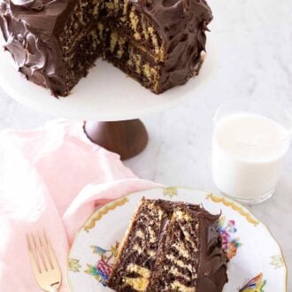 Pinterest graphic of a slice of zebra cake on a plate in front of the rest of the cake on a cake stand and a glass of milk.