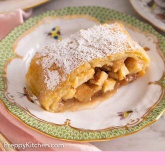 Pinterest graphic of a piece of apple strudel with powdered sugar on top.