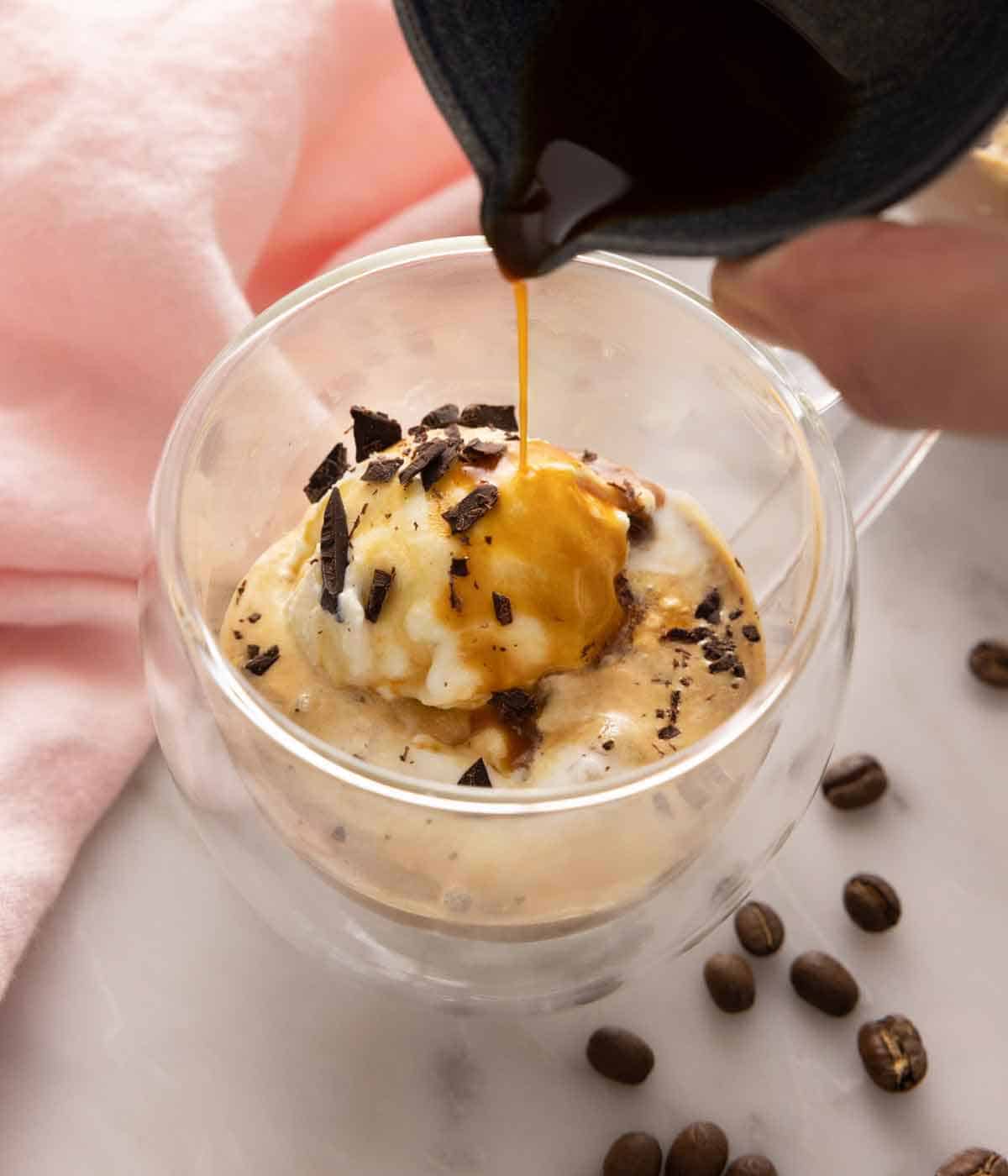 A cup of ice cream with espresso poured over.