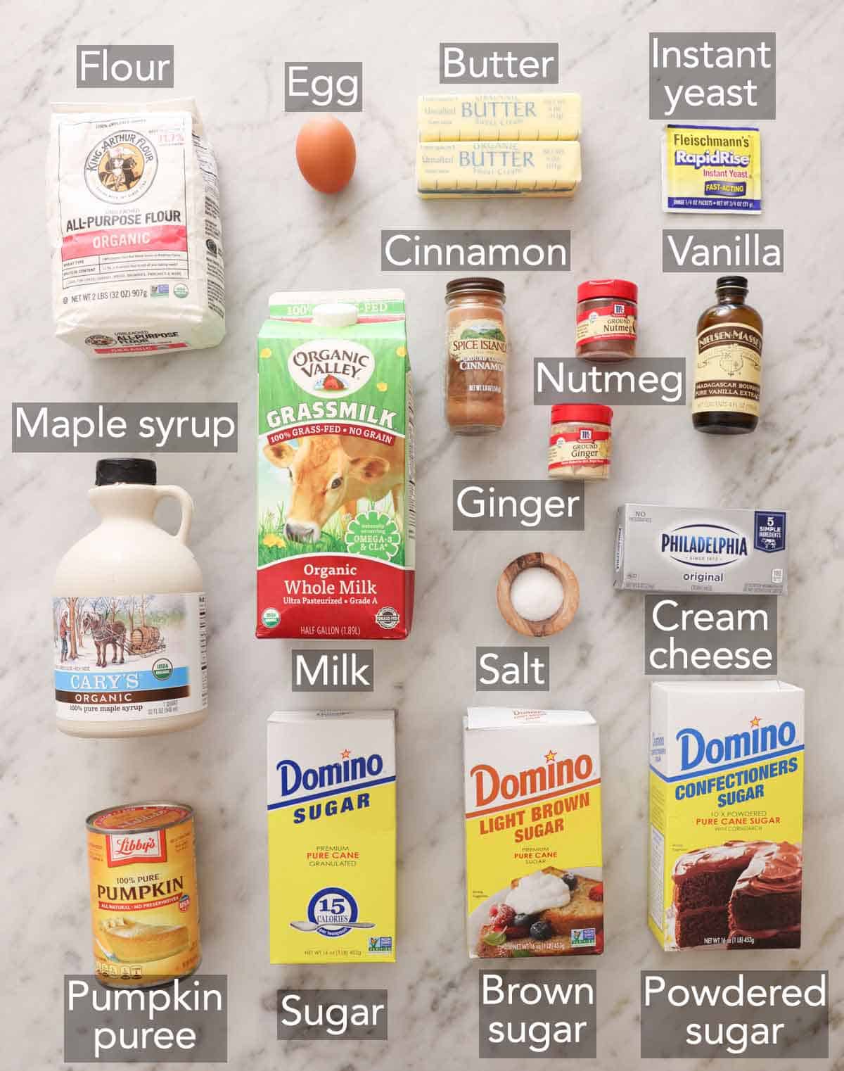 Ingredients needed to make pumpkin cinnamon rolls.