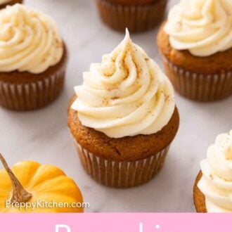 Pinterest graphic of multiple pumpkin cupcakes with one in focus in the middle.