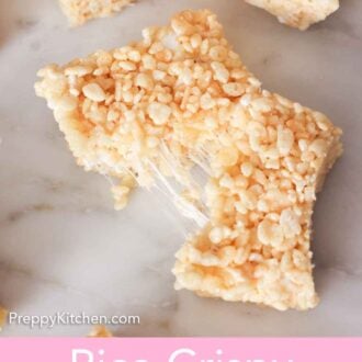 Pinterest graphic of a rice crispy treat being torn in half.