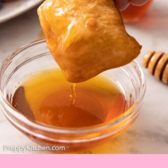 Pinterest graphic of a sopapilla dipped into a bowl of honey.