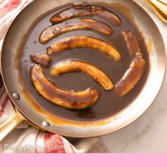 Pinterest graphic of a pan with sliced bananas in the caramel sauce.