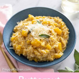 Pinterest graphic of a bowl of butternut squash risotto by a glass of wine.