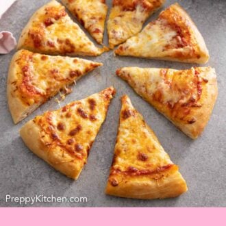Pinterest graphic of a cut cheese pizza with a slice pulled forward.