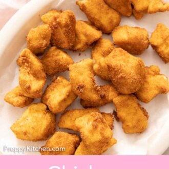 Pinterest graphic of a plate of chicken nuggets.