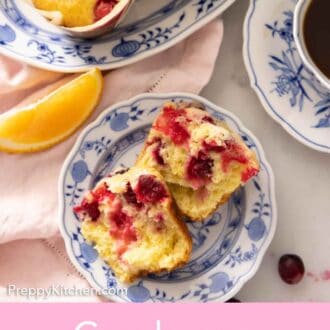 Pinterest graphic of a cranberry orange muffin torn in half on a plate.