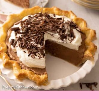 Pinterest graphic of a French silk pie with a slice cut out, on a plate in the back.