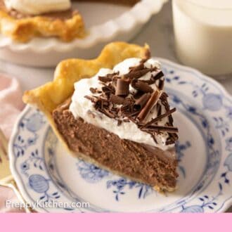 Pinterest graphic of a plate with a slice of French silk pie in front of a cup of milk.