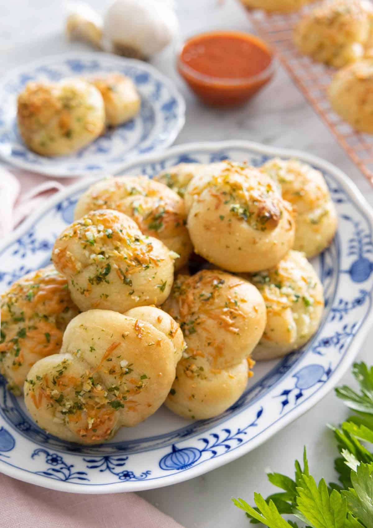 A plate with multiple garlic knots.