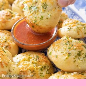 Pinterest graphic of a garlic knot dipped into sauce.
